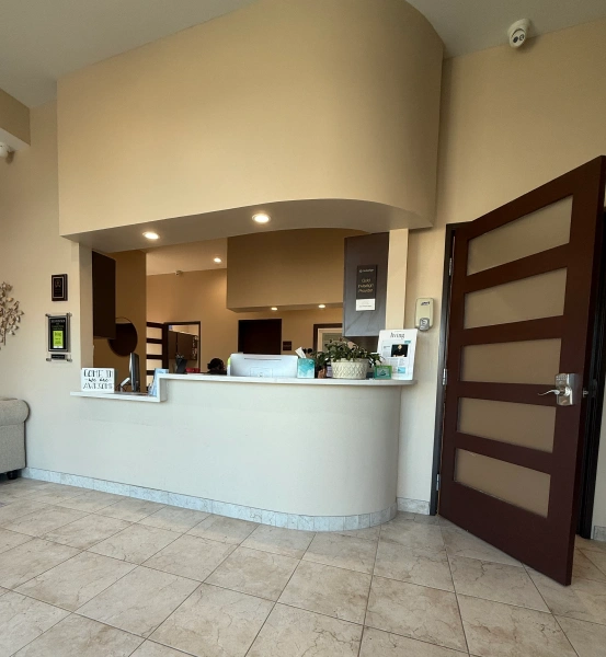 South Arlington Smiles dental practice front desk and reception lobby in Arlington, TX.