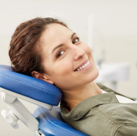 New patient smiling comfortably in a dental chair during a welcoming first visit at South Arlington Smiles in Arlington, TX.